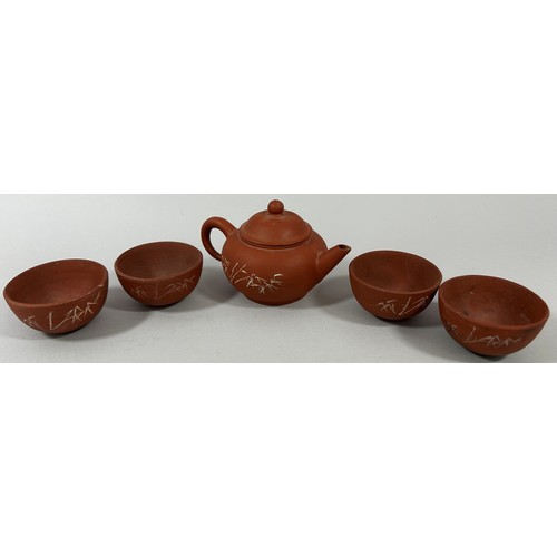 70 - A large collection of Chinese Yixing terracotta type teapots