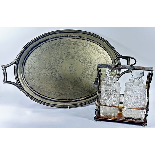 197 - A two decanter silver plated tantalus stamped CG&Co Cogent Plate, with a working lock and two keys, ... 