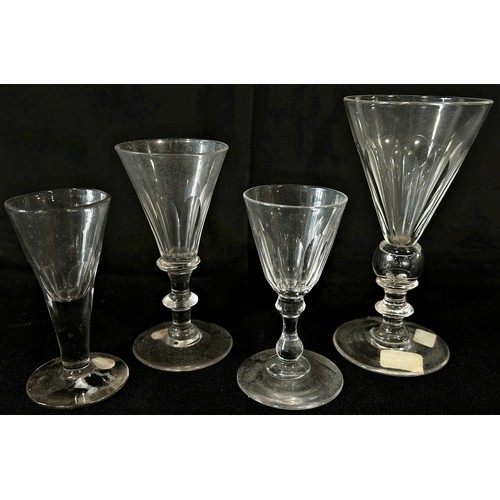 185 - A mixed selection of nine small early 19th century conical wine and port glasses.