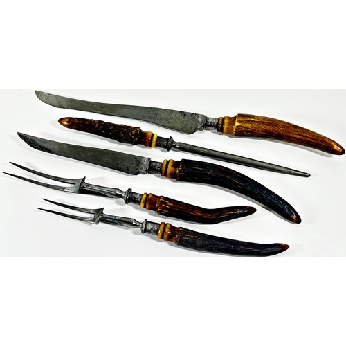 210 - Two pairs of carving knives and forks with antler handles and silver collars, both well used and VER... 