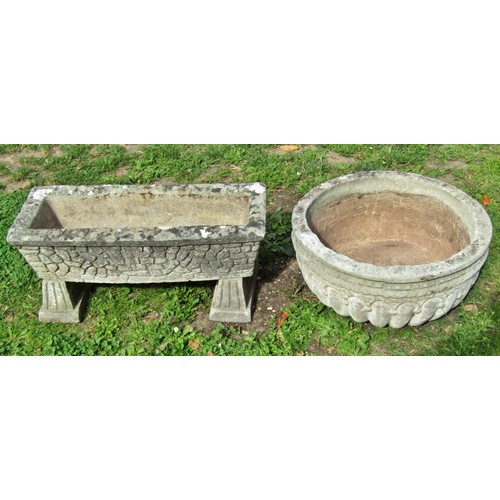 1063 - A weathered cast composition stone squat circular planter with lobbed bowl 25 cm high x 55 cm diamet... 