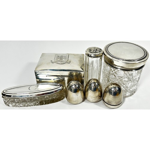 245 - Silver dressing table ware including a hand mirror, hair and clothes brush, three glass jars, comb, ... 