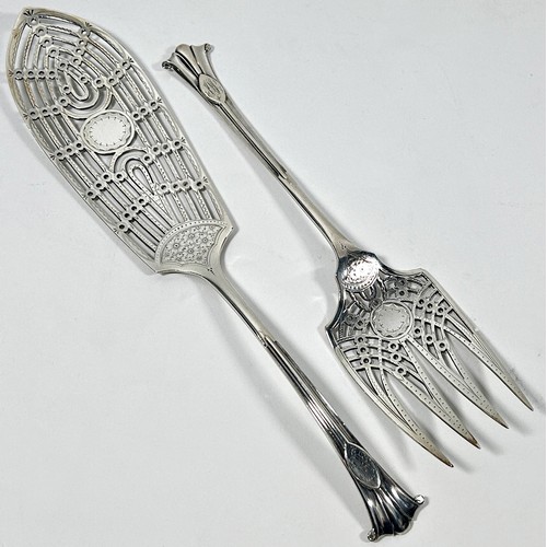 247 - A cased pair of Mappin & Webb fish servers, Sheffield 1894, both with intricate engraving and open w... 