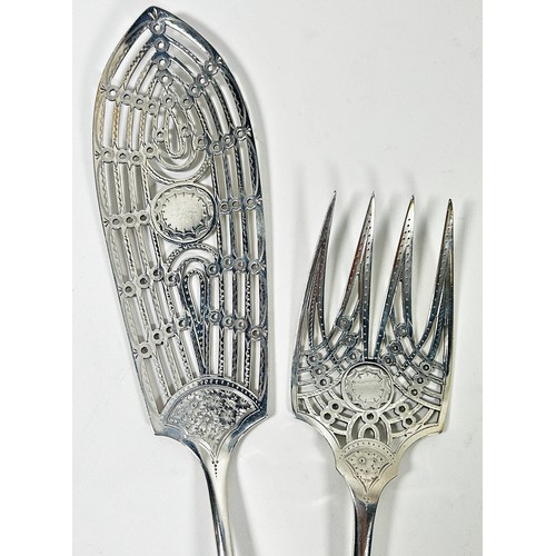 247 - A cased pair of Mappin & Webb fish servers, Sheffield 1894, both with intricate engraving and open w... 