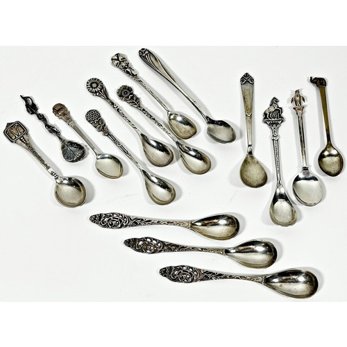 248 - A collection of nearly fifty silver souvenir and crested teaspoons mainly Dutch, 17 ozs approximatel... 