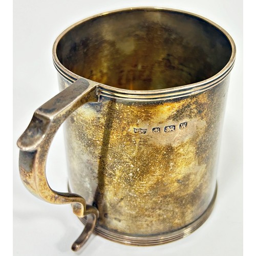 251 - A silver Mappin & Webb christening mug bearing the initials C N M, Birmingham 1921, 8 cm high, 5.1 o... 