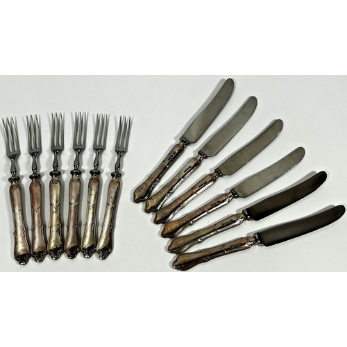 262 - A set of six matching silver handled fruit knives and forks and six further fruit knives