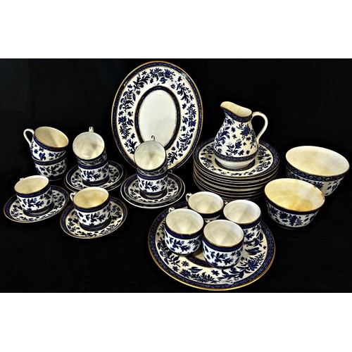 138 - A Victorian tea set with blue and white floral detail within gilded band