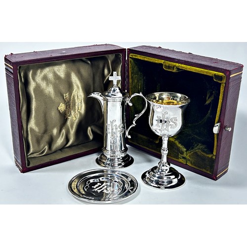 263 - A Mappin & Webb silver travelling communion set with chalice, ewer and patten, Sheffield 1902, in it... 