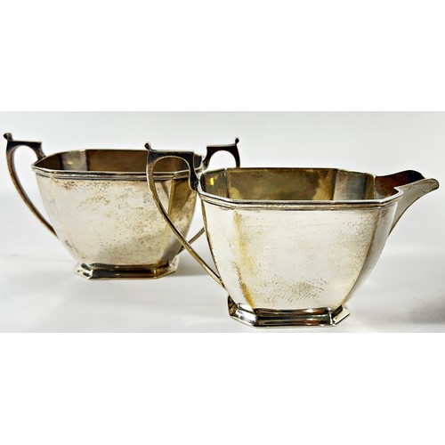 264 - A silver Art Deco style four piece tea service, Sheffield 1945, maker Harrison Brothers & Houson, 55... 