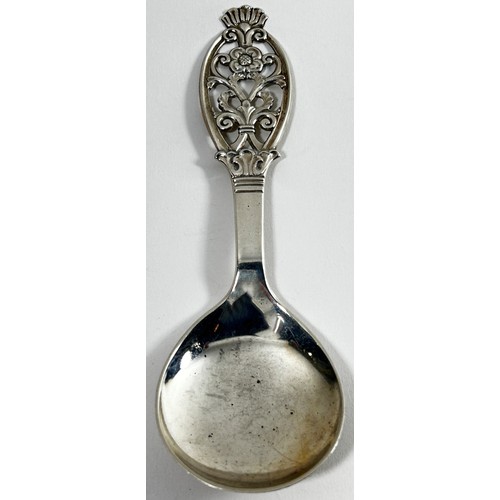 269 - A mixed lot of silver spoons to include a Norwegian carved handled spoon stamped 830, a silver soup ... 