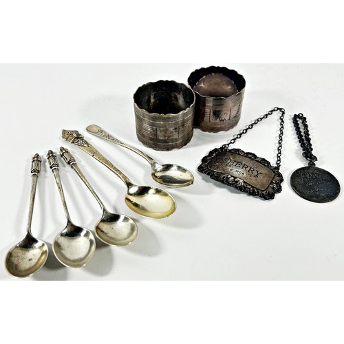 272 - A silver lot of three teaspoons with monk like figures to the heads, a single Thai teaspoon, a silve... 