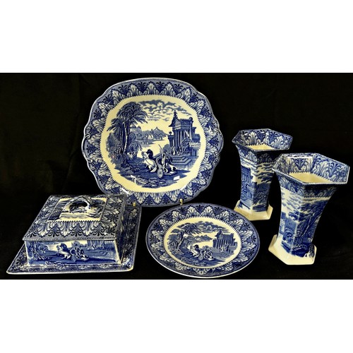 83 - A collection of Cauldon chariot pattern ware, including butter dish and cover, two plates, two vases... 