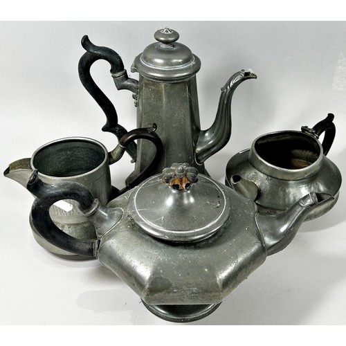 194 - A quantity of antique pewter tableware, including tankards, teapots, plates etc.