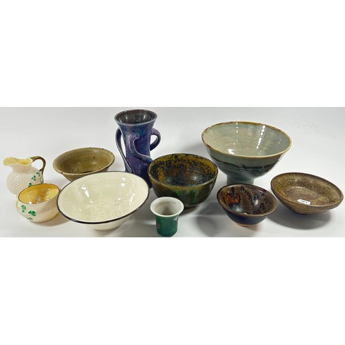 119 - Six studio pottery bowls together with a vase and small jug and bowl in Belleek