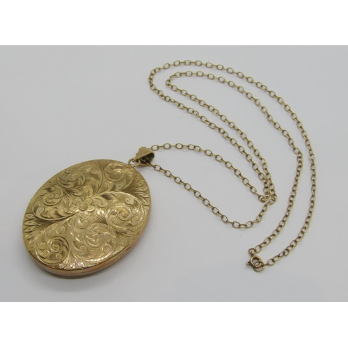 311 - Large vintage 9ct locket with engraved scrolled and floral decoration, maker 'FBros', Birmingham 197... 