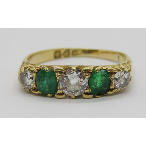 316 - Edwardian 18ct five stone emerald and diamond ring, centre diamond 0.40ct approx, outer diamonds 0.1... 