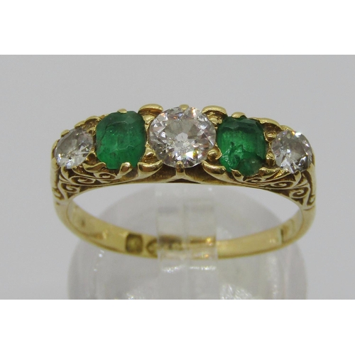 316 - Edwardian 18ct five stone emerald and diamond ring, centre diamond 0.40ct approx, outer diamonds 0.1... 