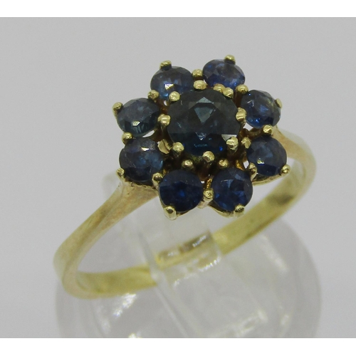 317 - Yellow metal sapphire daisy cluster ring, size O, 3.2g, together with four pearl necklaces of variou... 