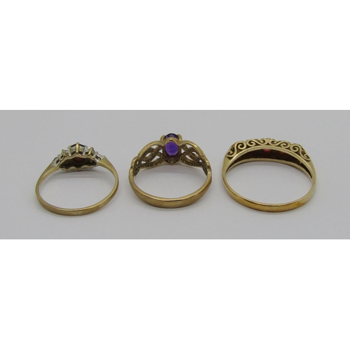 329 - Three vintage 9ct gem set dress rings comprising a five stone ruby example, size Q, a Celtic style a... 