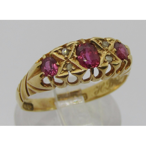 332 - Early 20th century 18ct ruby and diamond ring, inscribed to interior, maker 'H.W.Ld', Birmingham 191... 