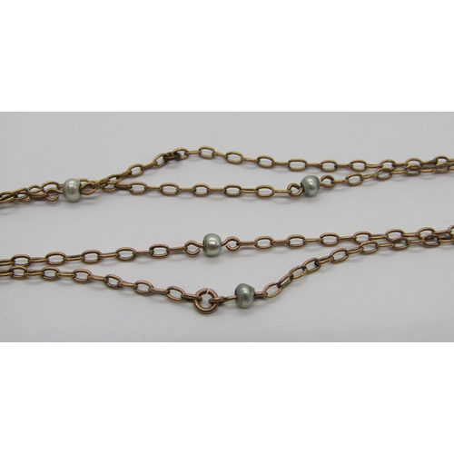 334 - Early 20th century yellow metal pearl sautoir necklace, 160cm L approx 10.3g, together with a Victor... 