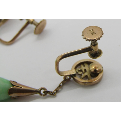 338 - Pair of early 20th century 14k jade drop earrings with screw fastenings, 5g, together with a similar... 