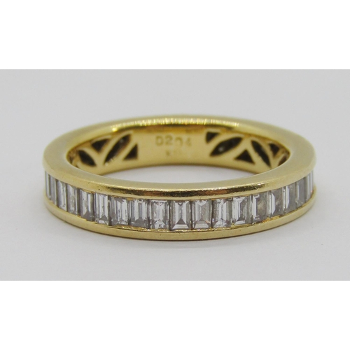 347 - 18k baguette-cut diamond eternity ring, stamped 'D204', size N/O, 4.8g