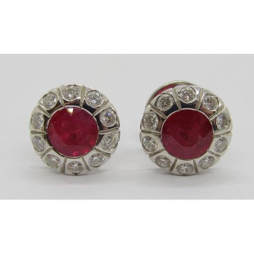 350 - Pair of 18ct white gold ruby and diamond cluster stud earrings, rubies 1ct each approx, 4.7g (one bu... 