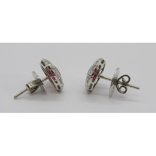 350 - Pair of 18ct white gold ruby and diamond cluster stud earrings, rubies 1ct each approx, 4.7g (one bu... 