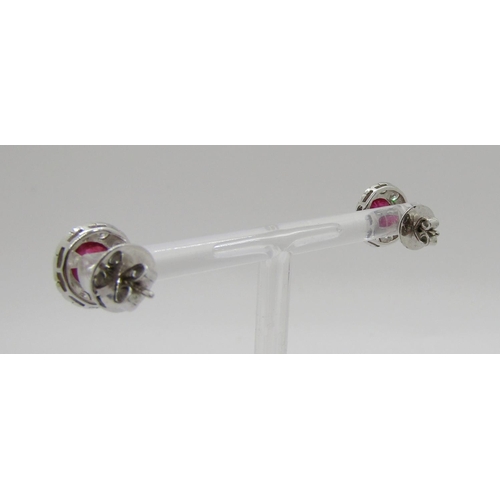 350 - Pair of 18ct white gold ruby and diamond cluster stud earrings, rubies 1ct each approx, 4.7g (one bu... 