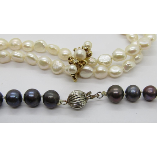 359 - Double strand baroque pearl necklace with 14ct clasp set with two diamonds and three pearls, togethe... 