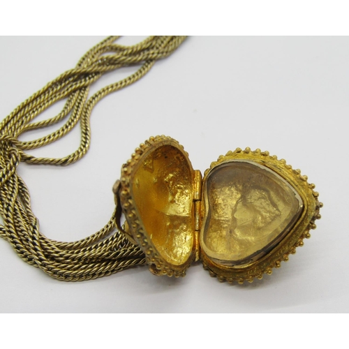 366 - Regency heart-shaped ornate yellow metal locket set with a floral cluster of foiled amethysts and a ... 