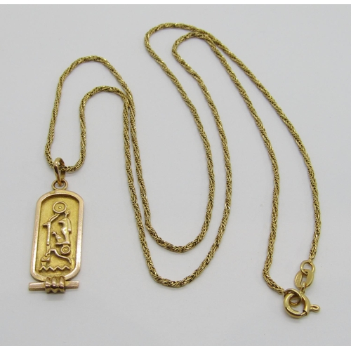 377 - Yellow metal Egyptian hieroglyphics pendant, 2.5g, hung on an 18ct rope twist chain necklace, 60.5cm... 