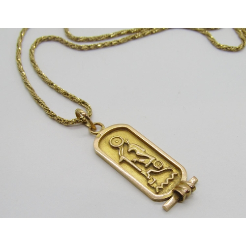 377 - Yellow metal Egyptian hieroglyphics pendant, 2.5g, hung on an 18ct rope twist chain necklace, 60.5cm... 