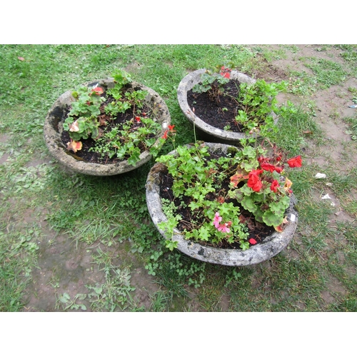 1037 - A pair of weathered cast composition stone squat conical shaped garden planters with ribbed detail, ... 