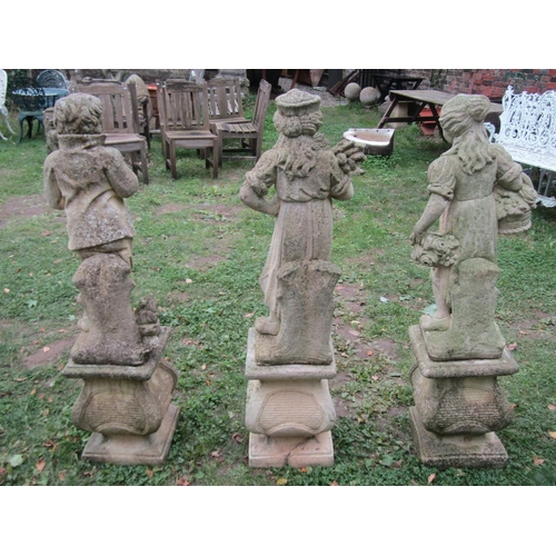 1054 - Three weathered cast composition stone garden ornaments representing three of the four seasons raise... 