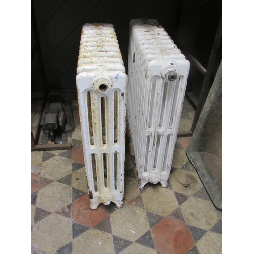 1099 - A pair of reclaimed cast iron floorstanding radiators, 62 cm high x 55 cm long x 14 cm (for recommis... 