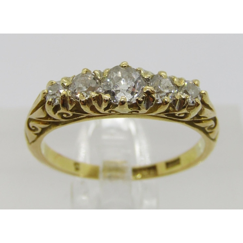 380 - Antique 18ct graduated five stone diamond ring, centre stone 0.20ct approx, outer pair 0.05ct each a... 