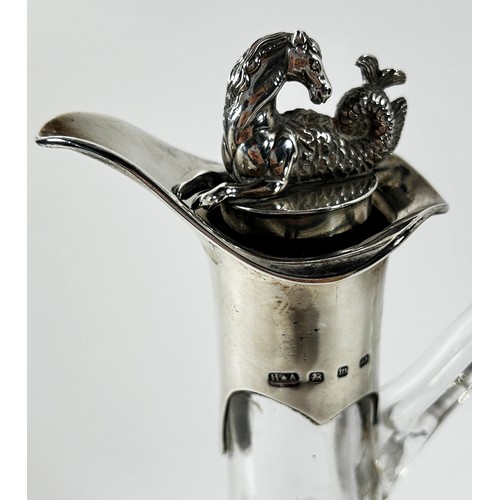 273 - A late Victorian dimpled glass decanter with a silver hippocampus cork stopper spout and collar, Bir... 