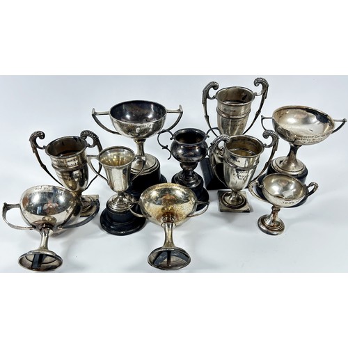 220 - Eight silver tennis trophies won by R G Reeve, two further smaller trophies and a vintage cricket ba... 