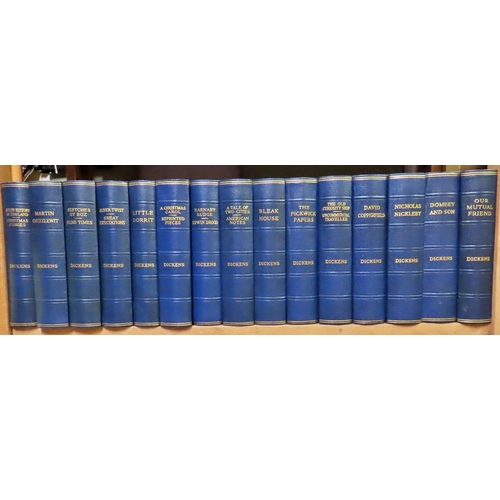 824 - Fifteen blue bound volumes of Charles Dickens and twelve brown bound volumes of classic literature, ... 