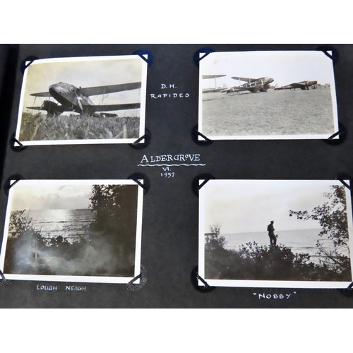 860 - A photographic album from the 1930s and 40s, belonging to R J Caton, featuring early airplanes, many... 