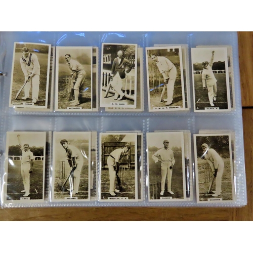 863 - A green cigarette card album featuring early 20th century Cricket and other Sports, WD & HO Wills, J... 