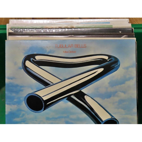 864 - A small collection of LPs including Tubular Bells, Fleetwood Mac, Chris de Burgh and a few Stag Part... 