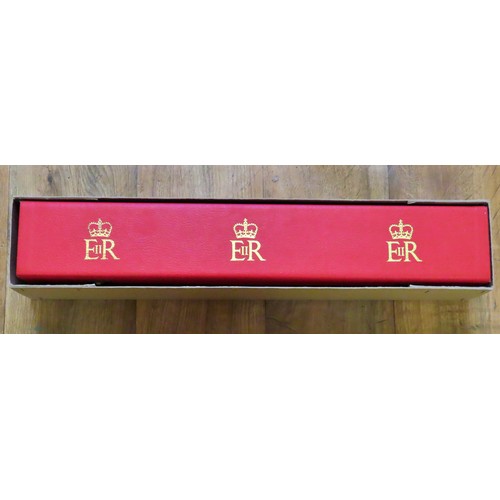 876 - A parchment scroll in a presentation Queen Elizabeth II red box (and original carton case) relating ... 