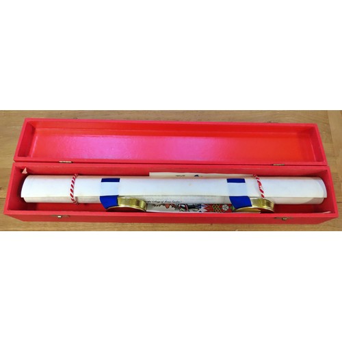 876 - A parchment scroll in a presentation Queen Elizabeth II red box (and original carton case) relating ... 