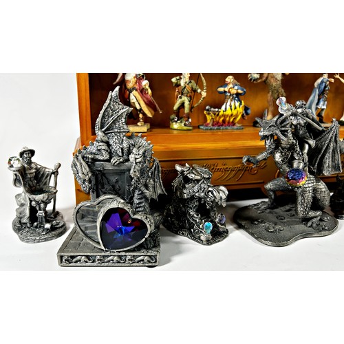 114 - A large collection of fantasy figures (Lord of the Rings and others), with a Lord Of The Rings displ... 