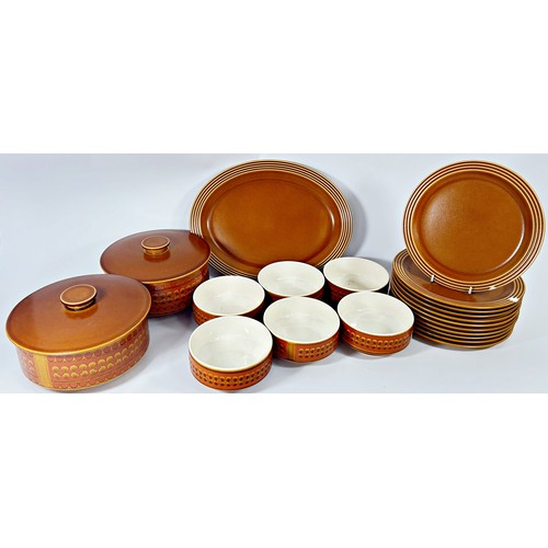 144 - A large collection of Hornsea saffron tableware, comprising graduating plates, bowls, tureens, jugs,... 