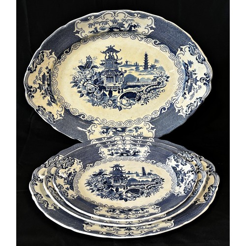 146 - A collection of 19th century and later blue and white meat dishes, platters etc including Willow pat... 